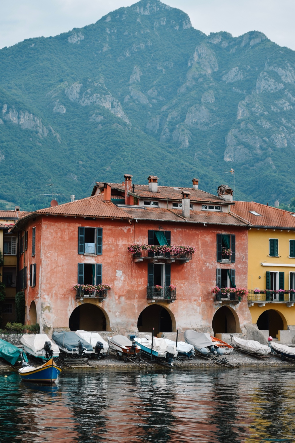 Traditional lakeside houses and boats at Lake Como