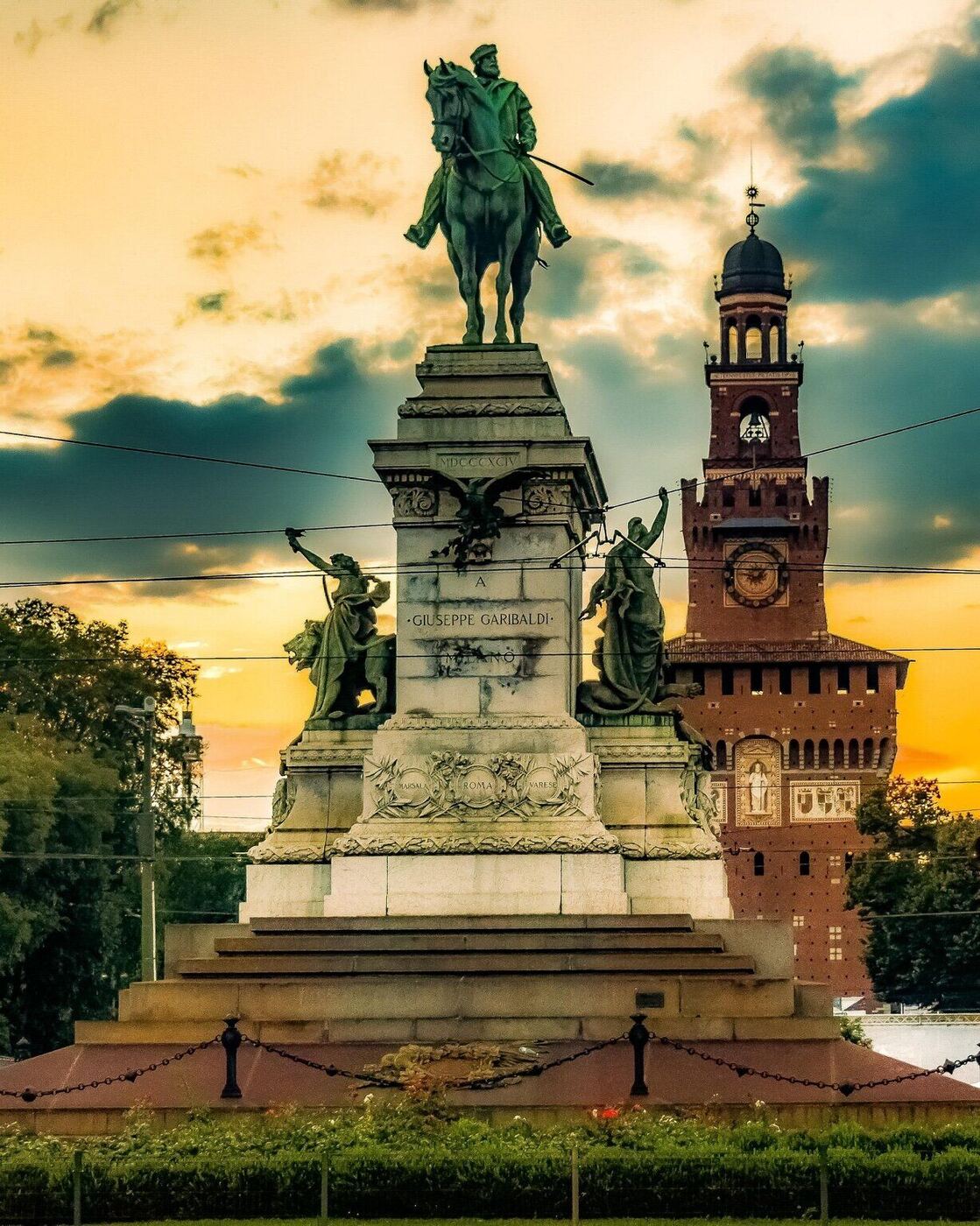 Garibaldi monument and Castello Sforzesco at sunset